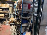 a room filled with lots of boxes and shelves
