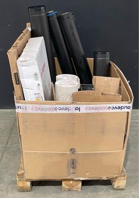 a cardboard box with a bunch of items in it on a pallet