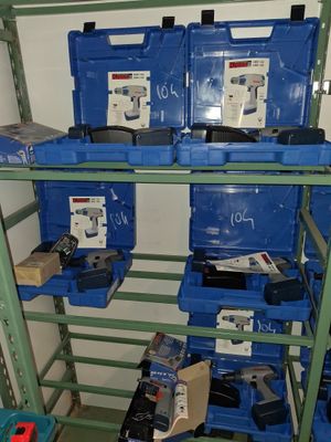 many blue boxes on the shelves in the room