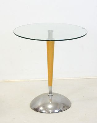 a glass table with a wooden base and a glass top