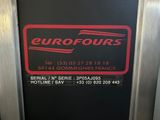 a black and red sign on the side of a metal door