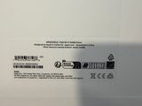 the back of a white box with a picture of a person holding a cell phone