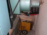 a machine that is sitting in the corner of a room