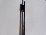a pair of skis sitting on top of a white surface