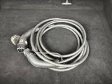 a cord in the trunk of a car that is connected to a charger