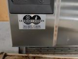 an image of a stainless steel oven with a timer on it