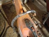 a chainsaw that is sitting on the ground in a room