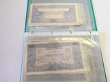 two old bank notes in a clear plastic case