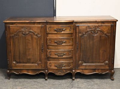 an old wooden dresser with drawers and drawers on top of it