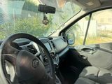 a car with a steering wheel and a dash board