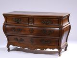 a wooden chest of drawers on a white background