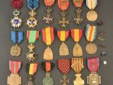 a large collection of medals and medals on display on a table