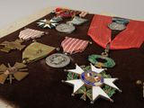 many medals and medals on a brown cloth