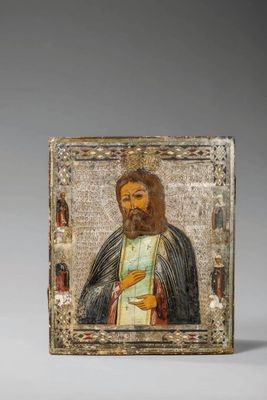 un tableau représentant un homme barbu tenant un livre dans la main droite