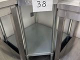 a metal table with a number on it in a kitchen