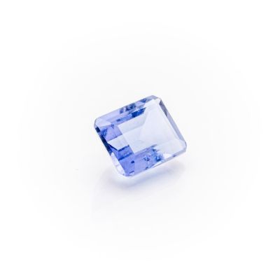 a blue sapphire stone on a white background
