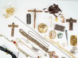 many different types of jewelry on a white surface