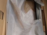 a cardboard box with a piece of paper inside of it