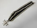 a close up of a medal with a star on it