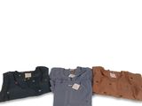 three men ' s shirts are lined up on a white background