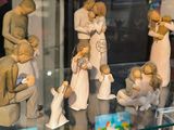 many figurines on display in a glass case