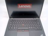 the lenovo laptop is open and ready to be used