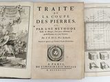 an old book with a drawing of a man on a horse and a map