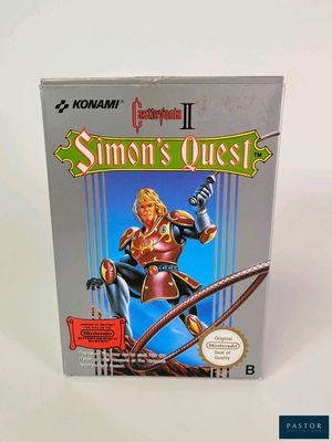 La boîte du jeu « Simon's Quest » est posée sur une surface blanche.