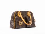 Sac à main Louis Vuitton en toile Monogram et cuir, avec finitions dorées