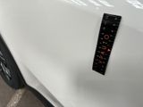 a close up of a sticker on a car ' s hood