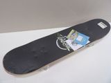 a skateboard that has a sticker on it