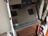 a machine that is sitting in the corner of a room