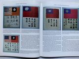 an open book with a picture of a flag and a picture of an asian flag