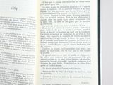 an open book with a picture of a cat on it
