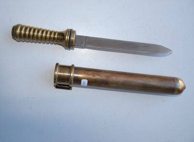 two knives that are laying next to each other on a table