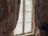 an image of a living room with a large window