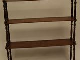 an image of a wooden shelf with three shelves on each side