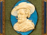 portrait d'un homme portant un chapeau et une pipe, dans un cadre