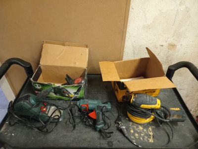 a box of tools on a table next to a box of tools
