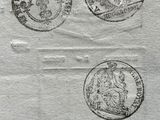 three stamps on a piece of paper with a drawing of a man and a woman