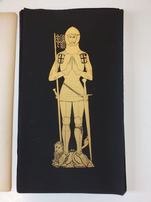 un livre sur lequel figure l'image d'une femme tenant un drapeau