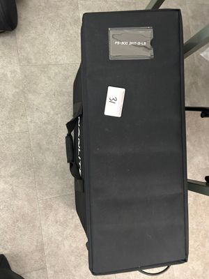 a suitcase that is sitting on the floor next to a chair