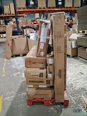 many boxes stacked on a pallet in a warehouse