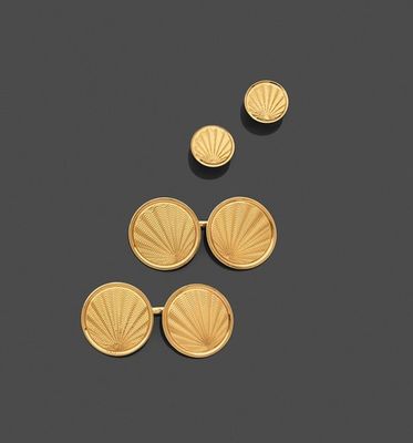 a pair of 18k gold cufflinks and a pair of 18k gold cufflinks