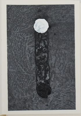 a black and white photo of a piece of paper with a flower on it