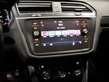 a picture of a car ' s dashboard with the radio on