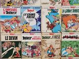 a lot of cartoon books on display on the floor