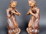 pair of carved wood figurines of a woman and child