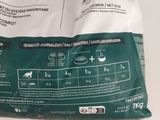 a bag of cat food sitting on a table