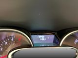 a close up of a car dashboard with a speedometer